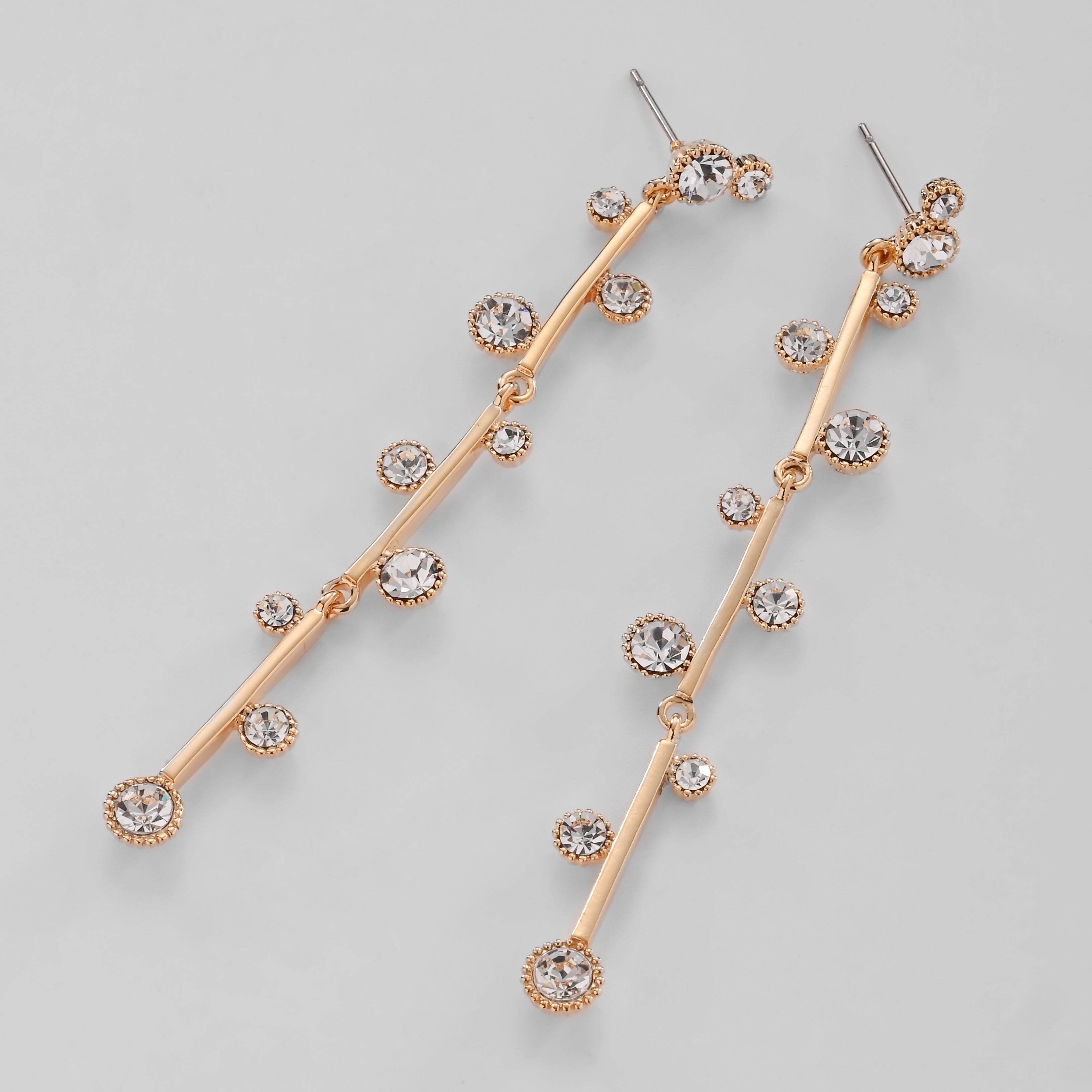 Elegantes pendientes colgantes de cristal dorado