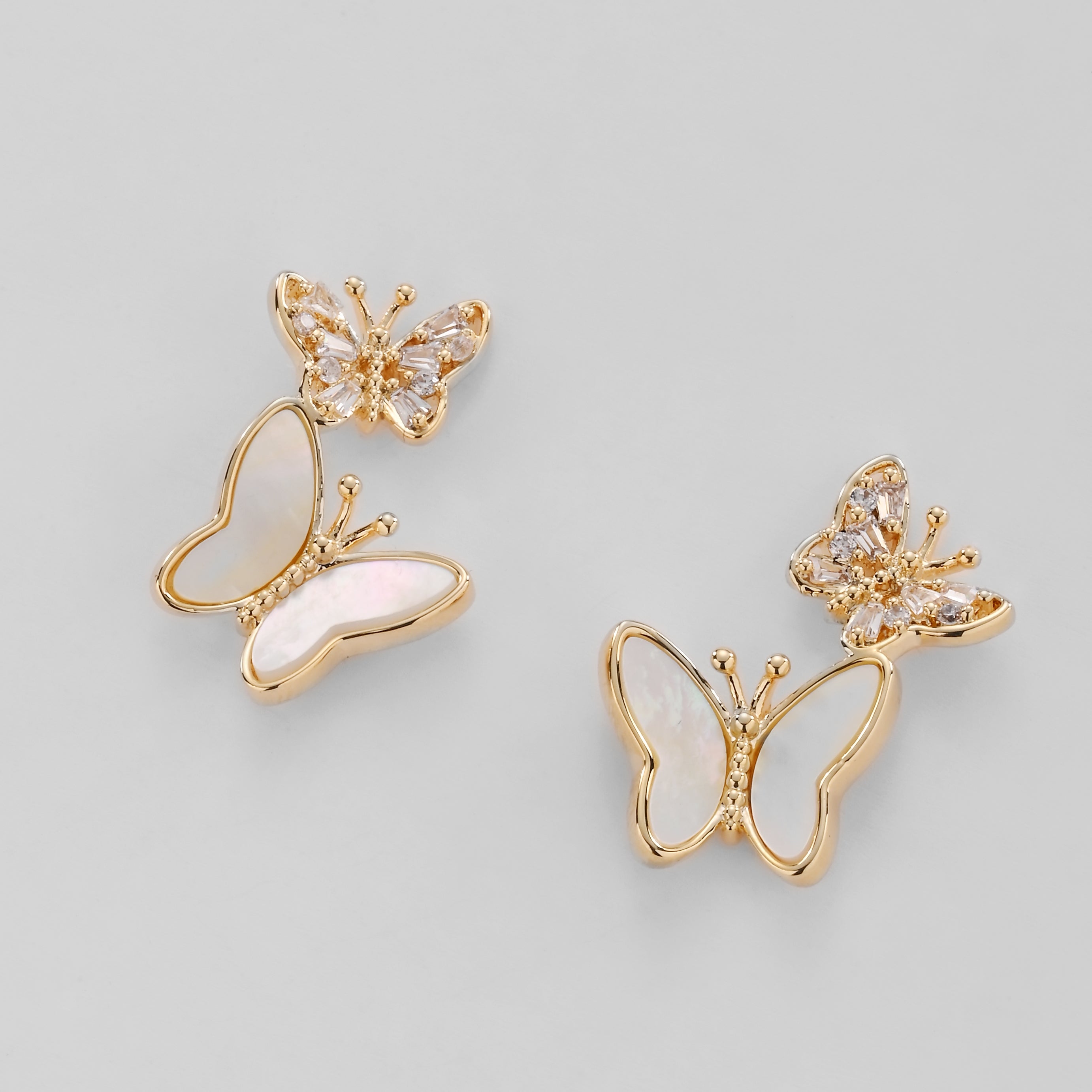 Pendientes colgantes de doble mariposa