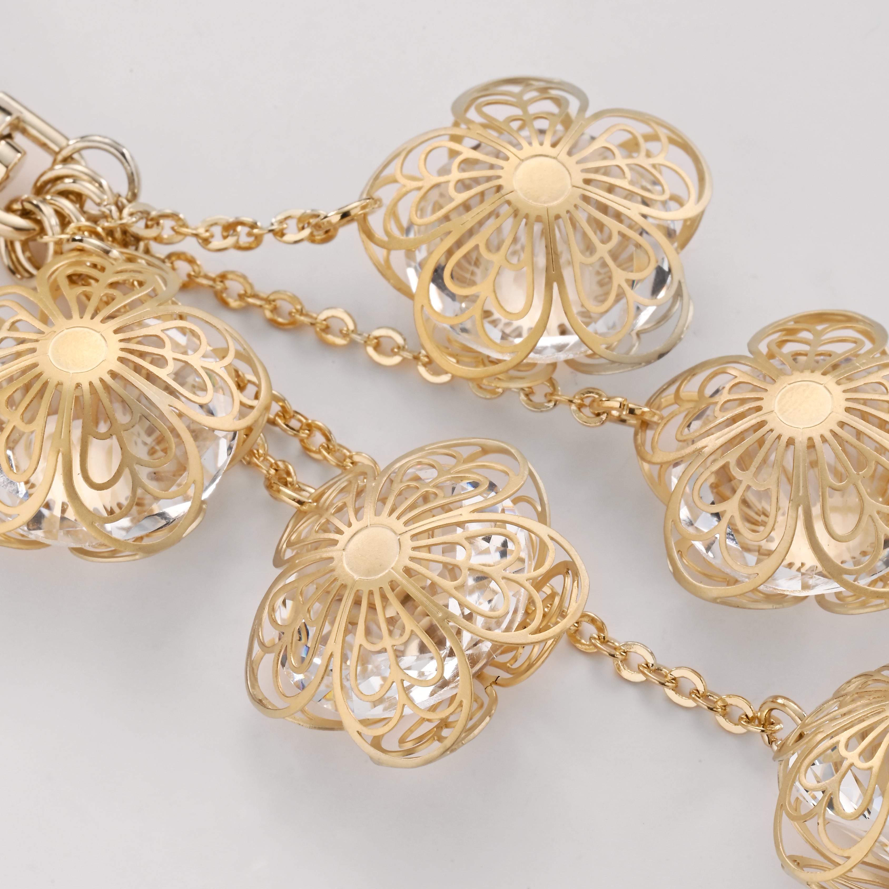 Charm para bolso Cascada de flores doradas