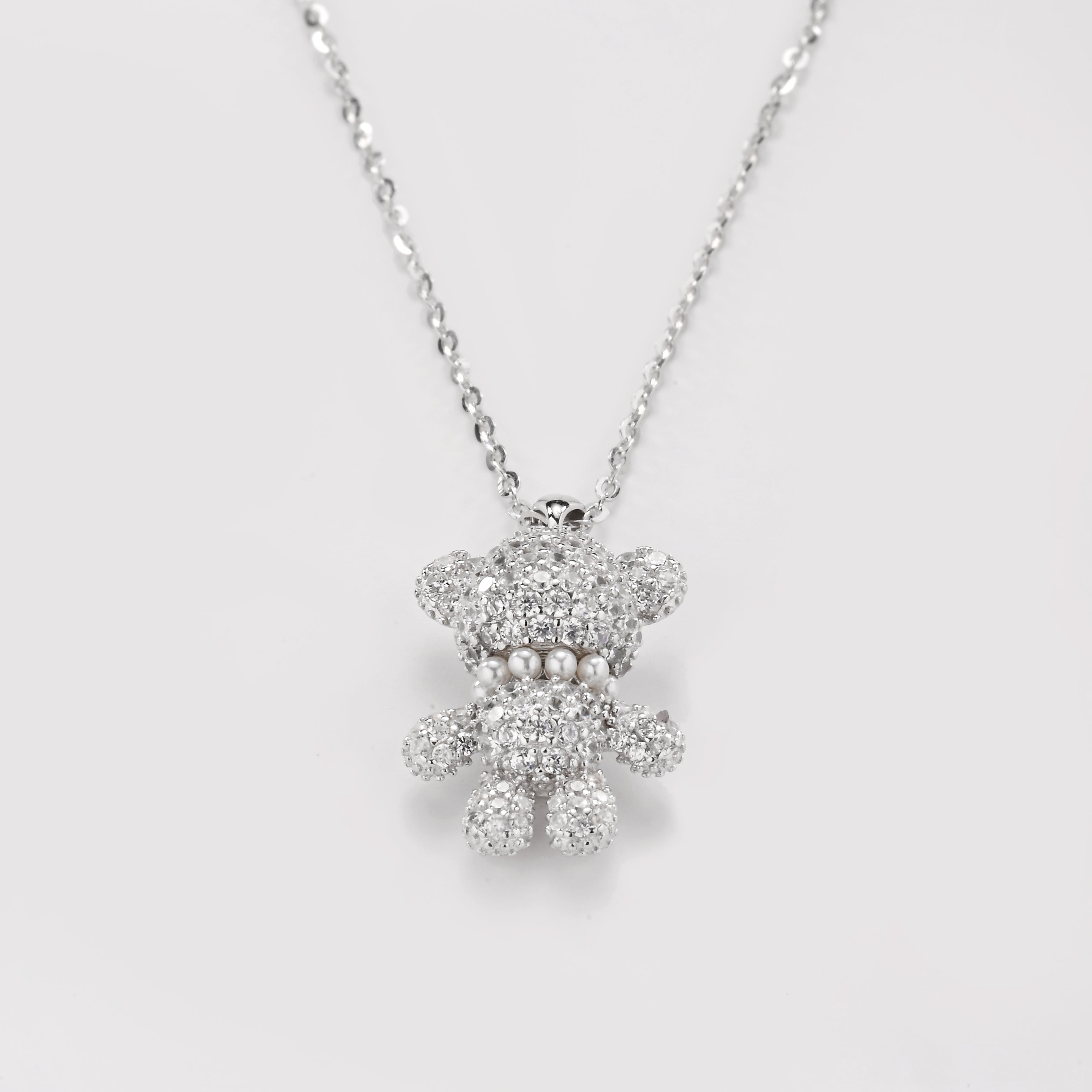 Collar con colgante de osito de peluche dorado