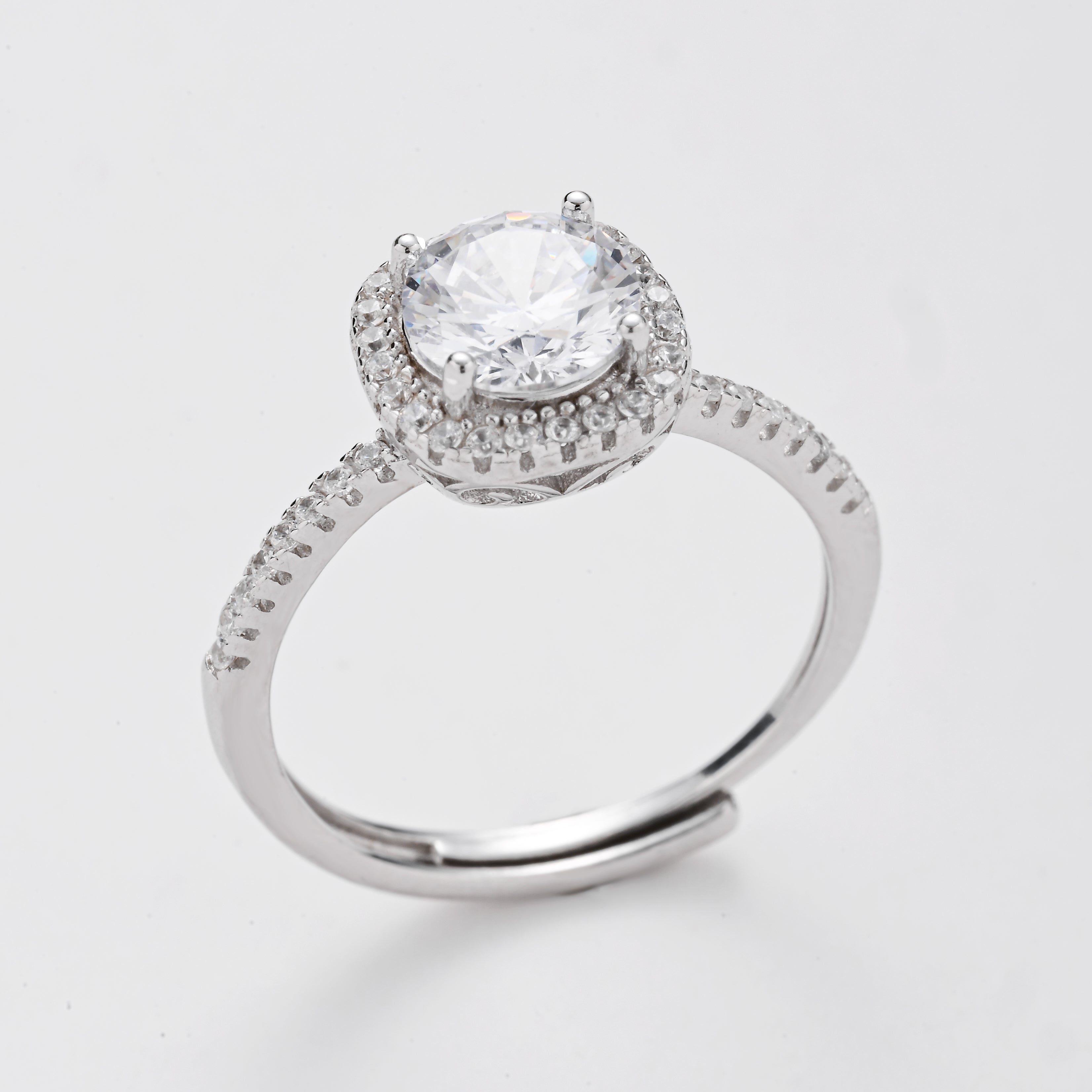 Anillo solitario con halo y corona radiante