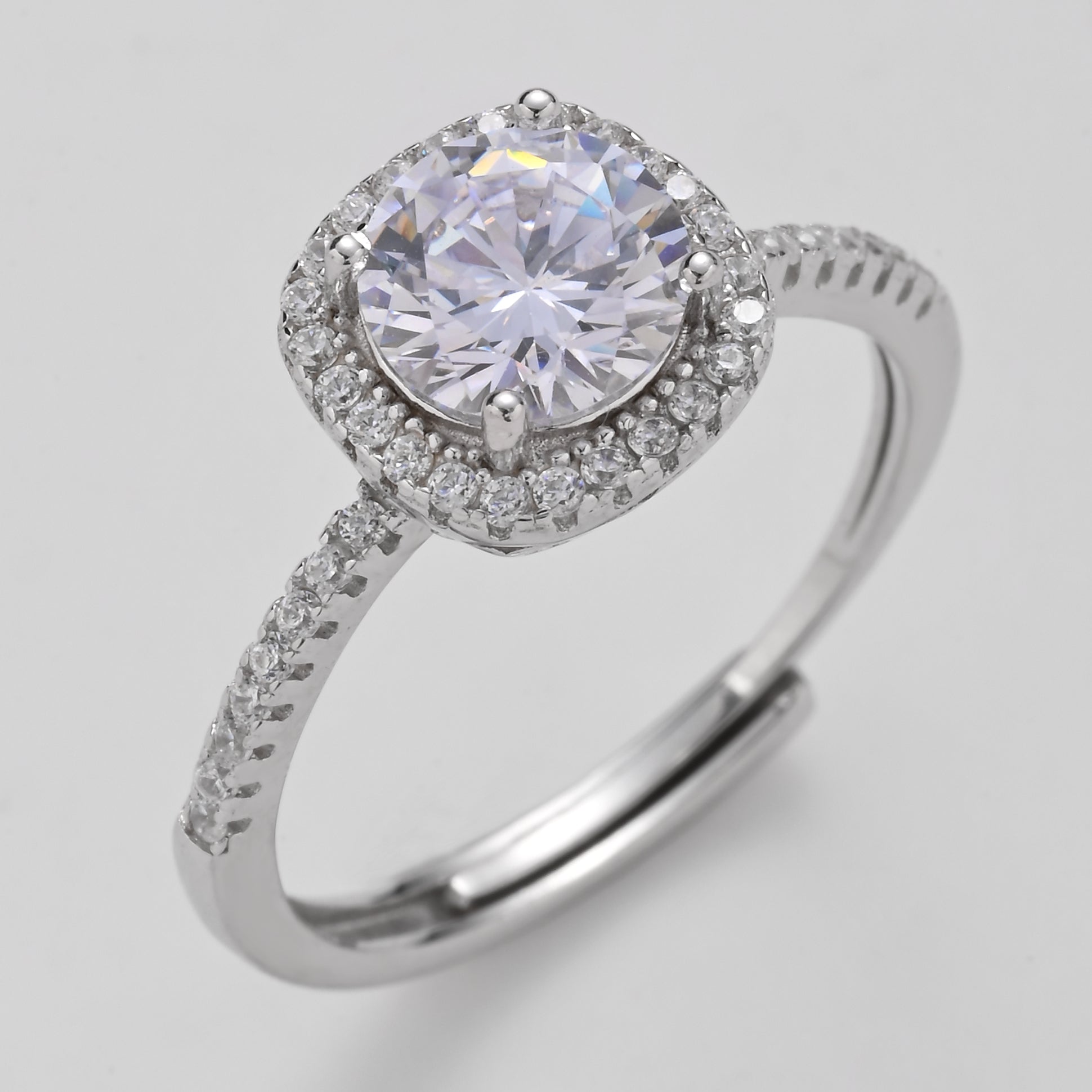 Anillo solitario con halo y corona radiante