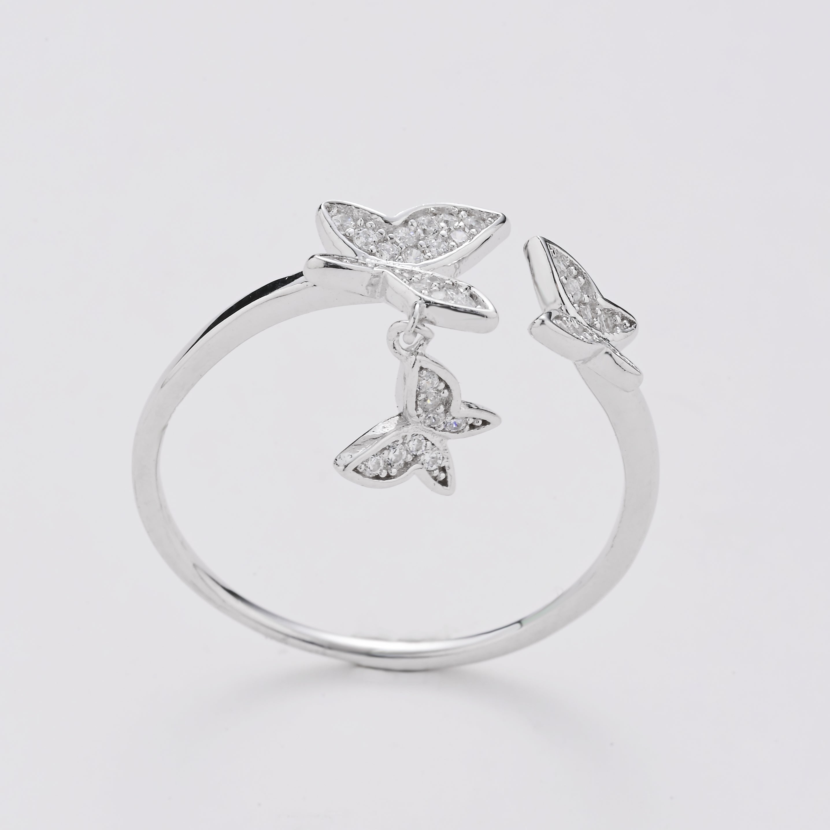 Anillo de trío de mariposas flotantes