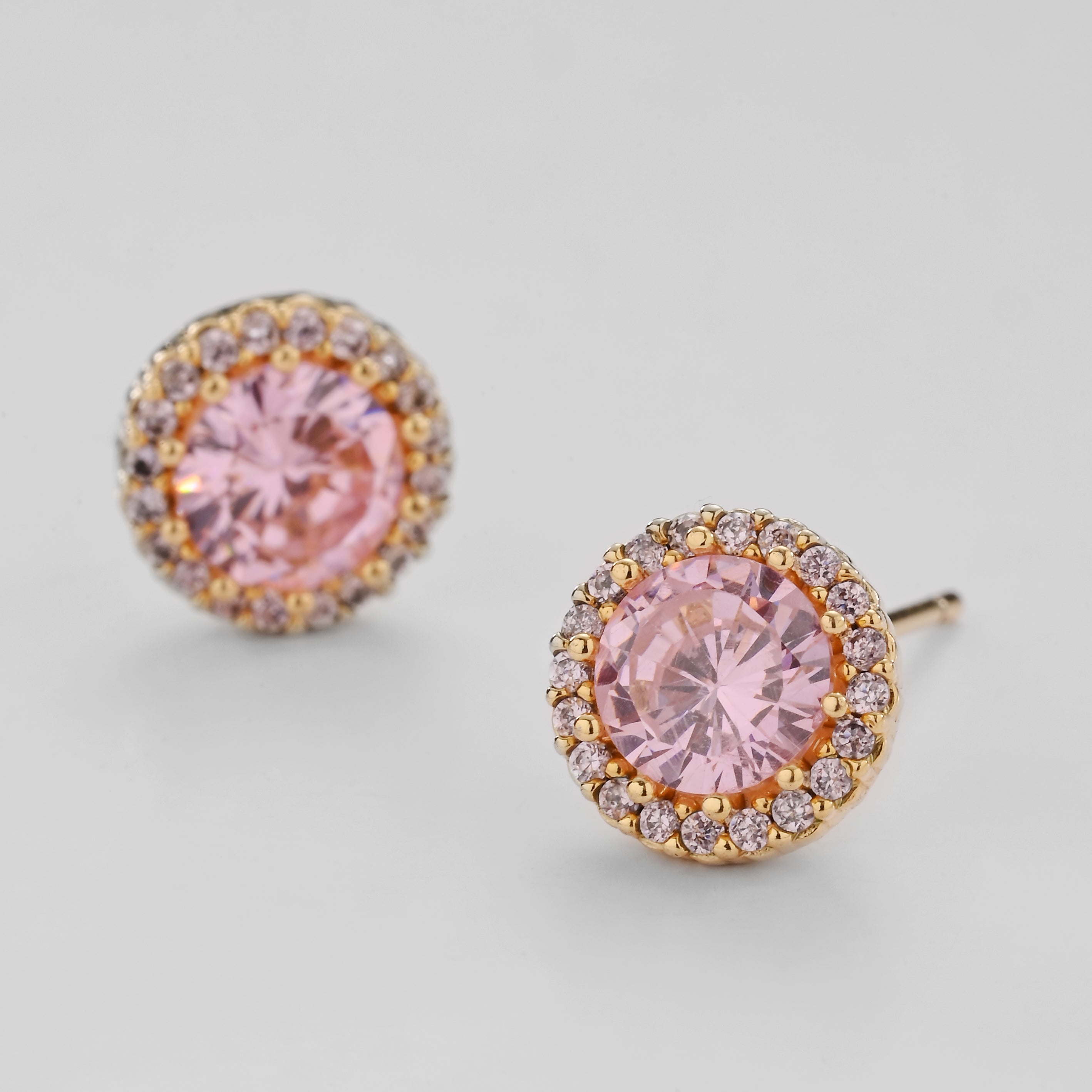 Pendientes de botón de cristal con halo rosa