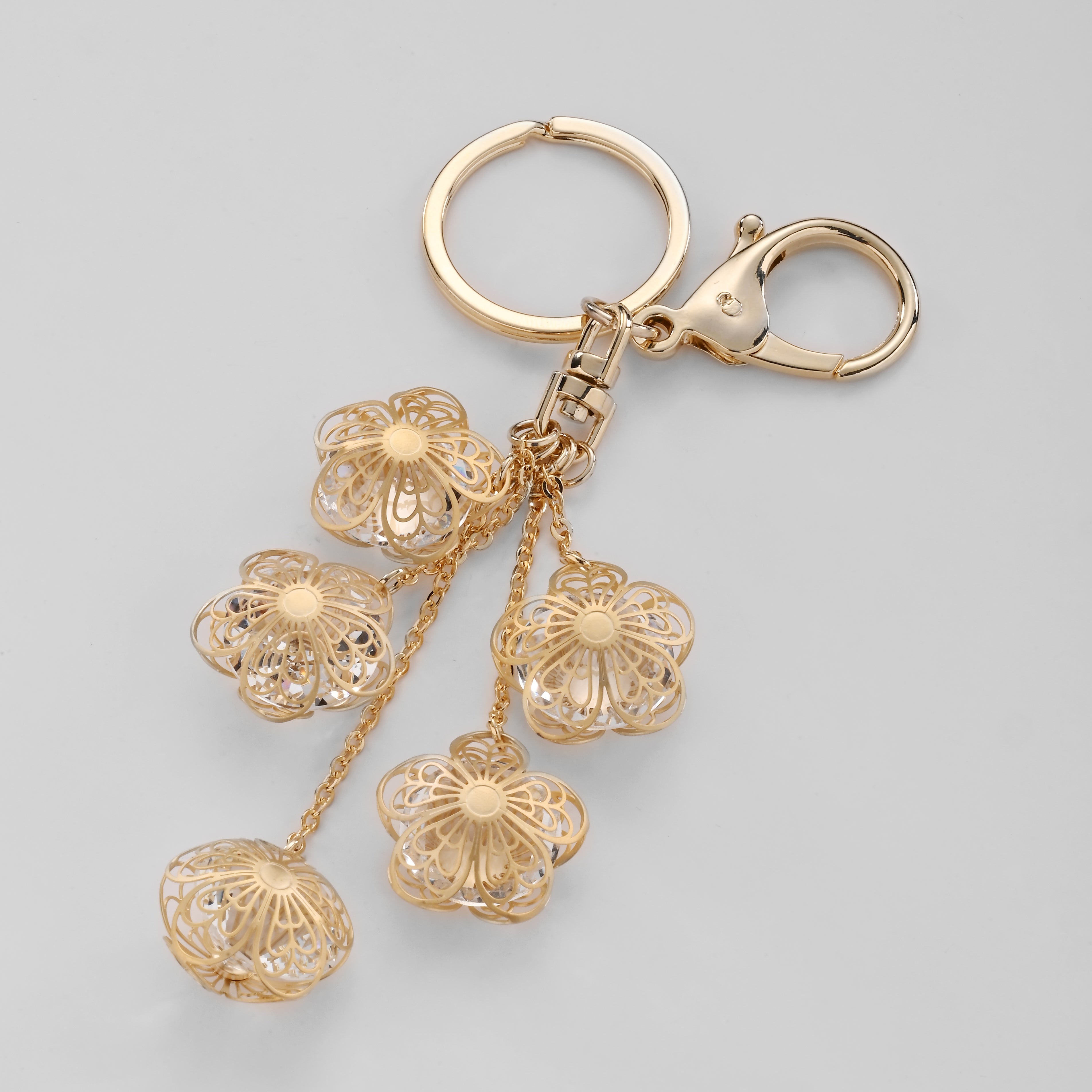 Charm para bolso Cascada de flores doradas