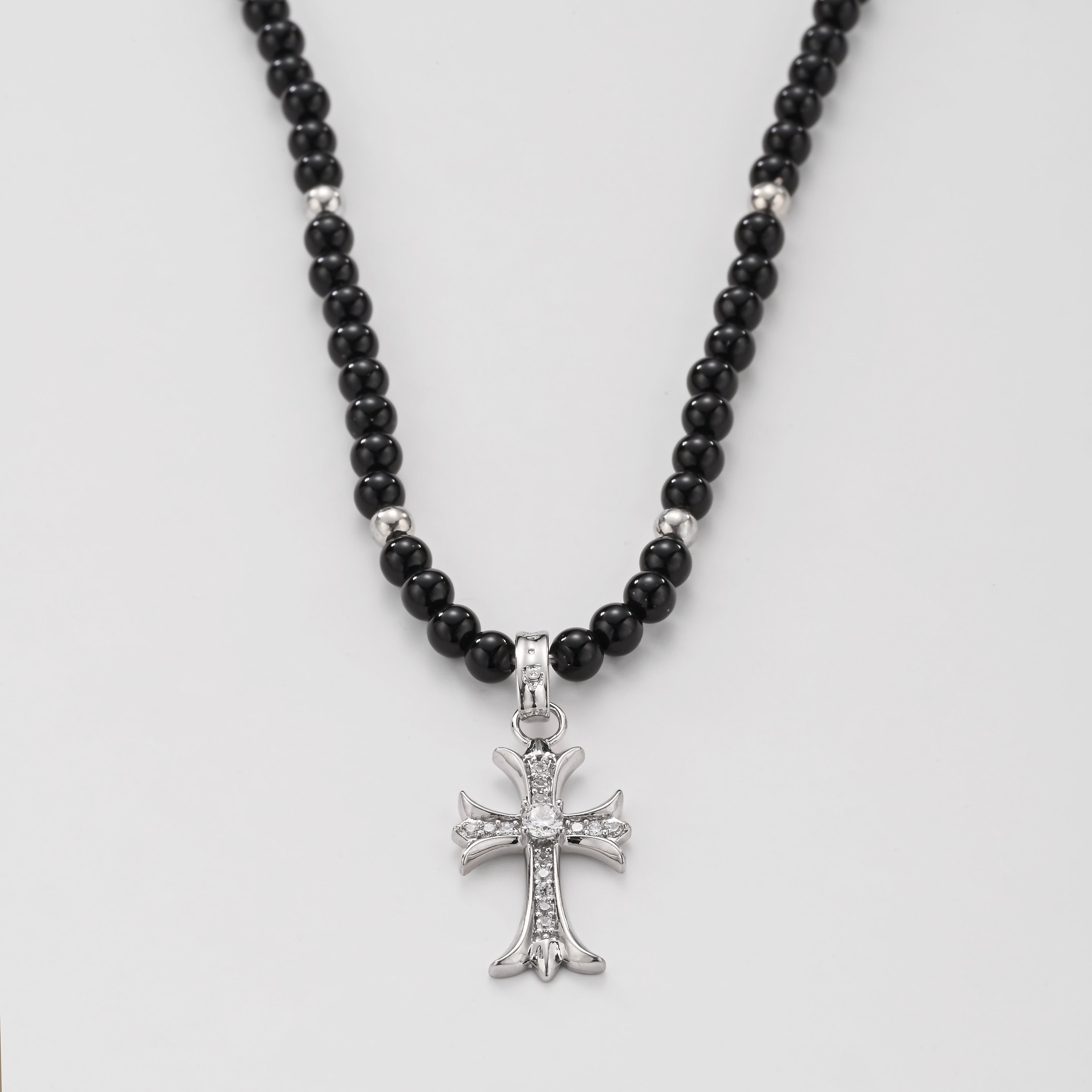 Collar de cruz de ónix y cristal