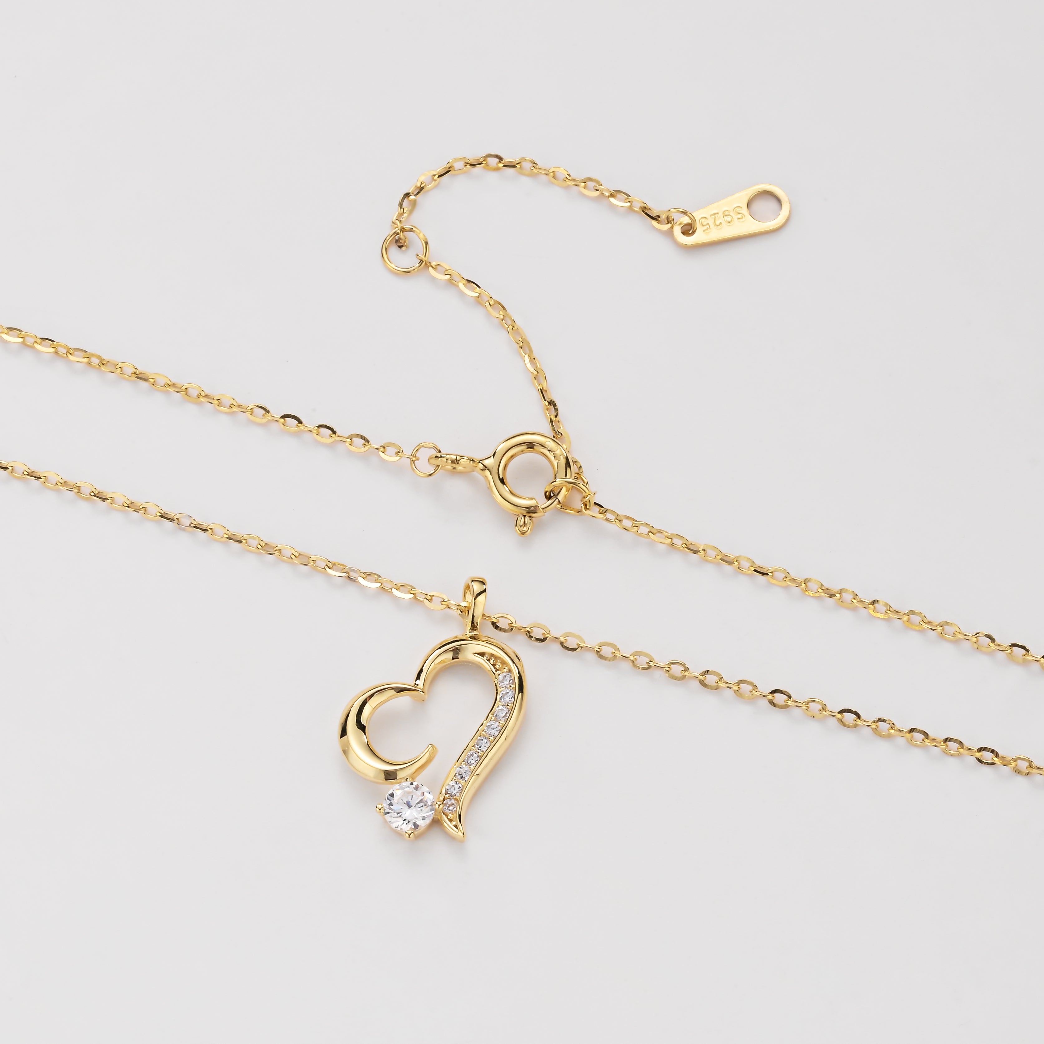 Collar de oro con corazón de cristal
