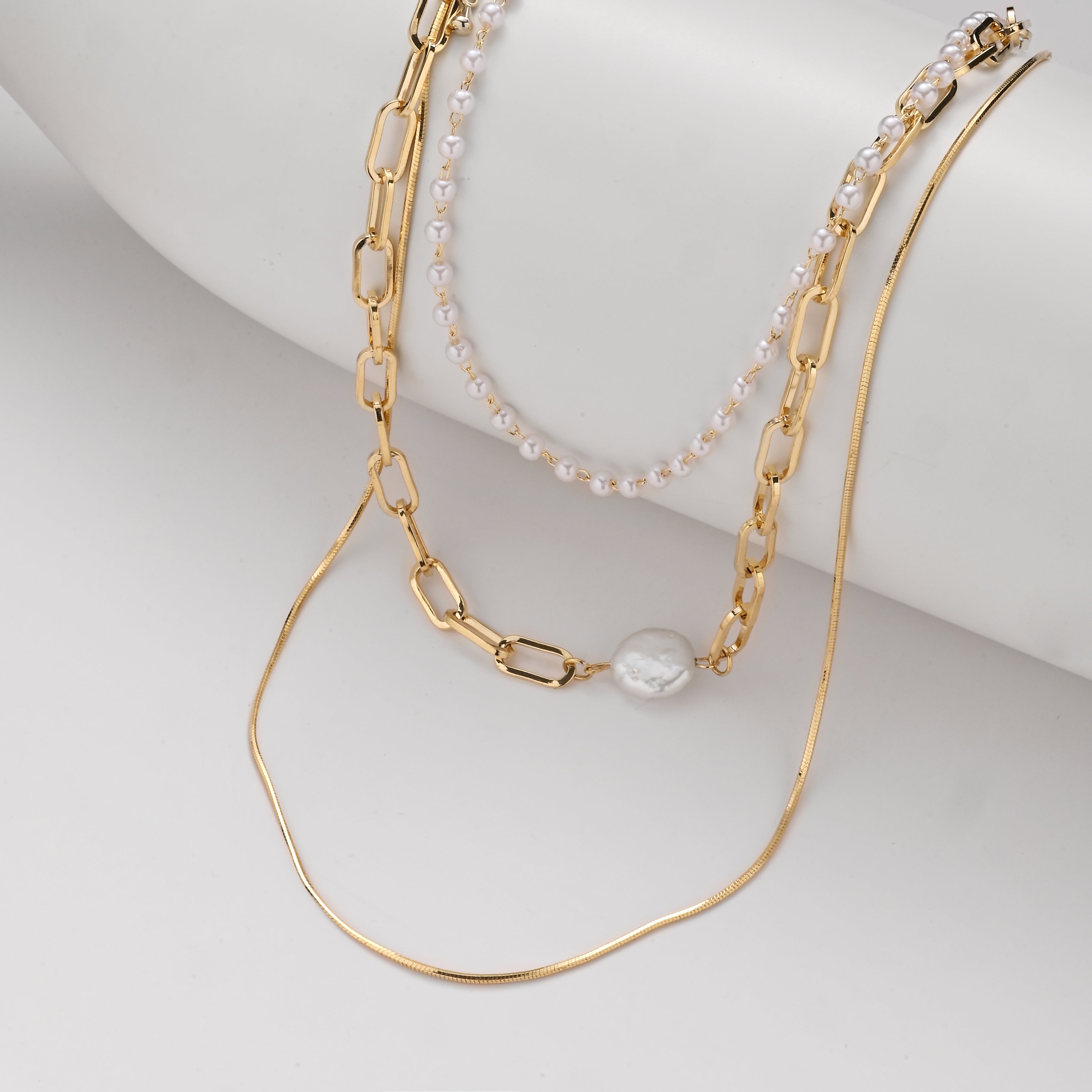 Conjunto de collar en capas con textura mixta
