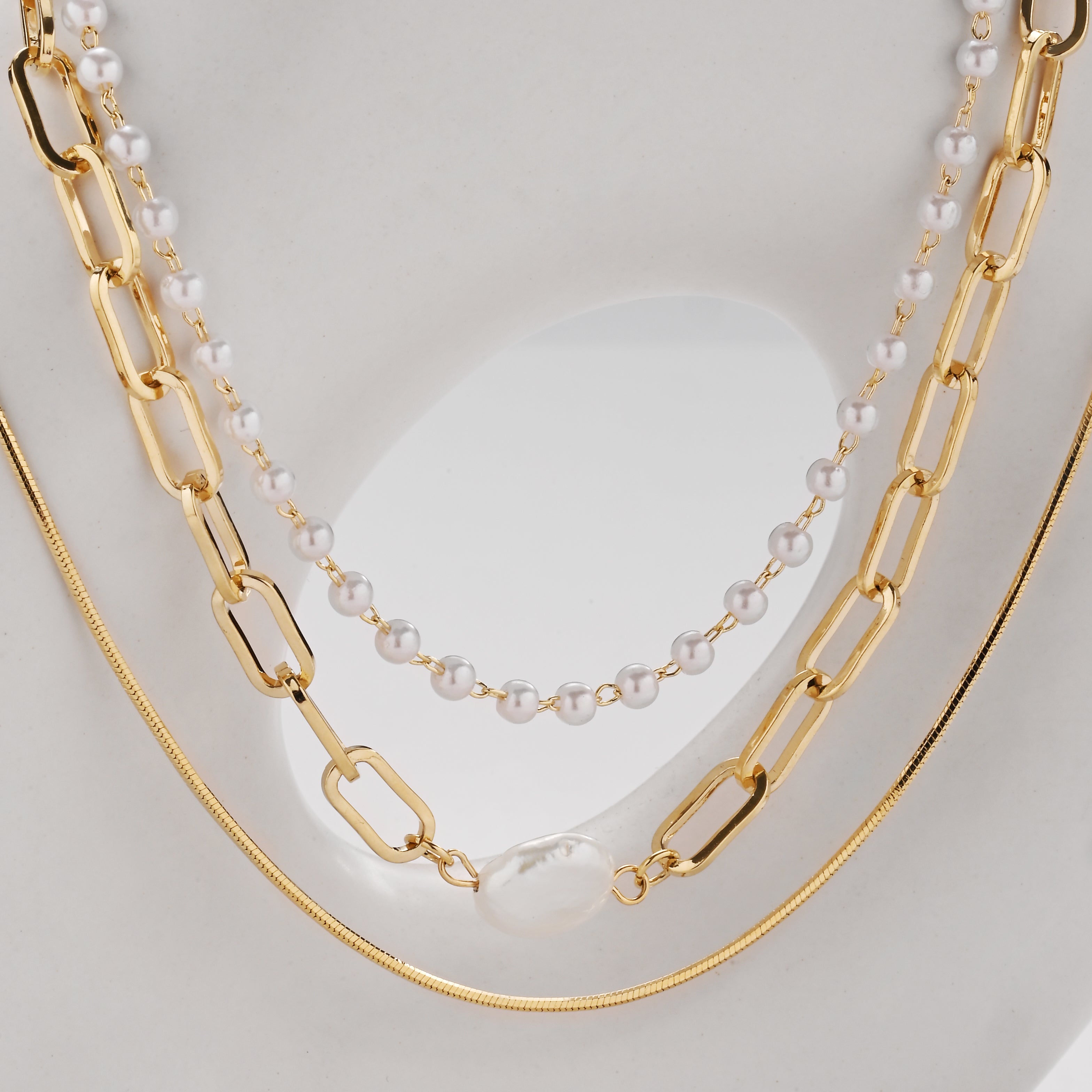 Conjunto de collar en capas con textura mixta